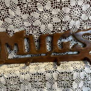 Vintage 1970s, wooden “Mugs” rack for coffee cups.